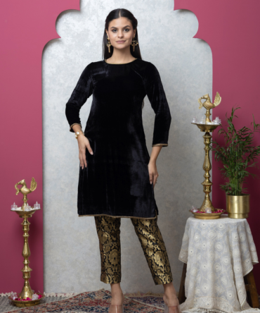 Black Velvet Kurta Set with Gold Lace Detailing by INDYAGENIUS Couture