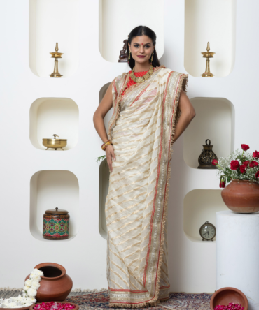 Ivory Shimmer Georgette Saree with Sanskrit Border by INDYAGENIUS Couture