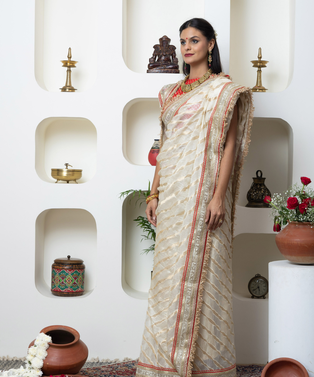 Ivory Shimmer Georgette Saree with Sanskrit Heritage Border & Red Accent Detailing - Image 4