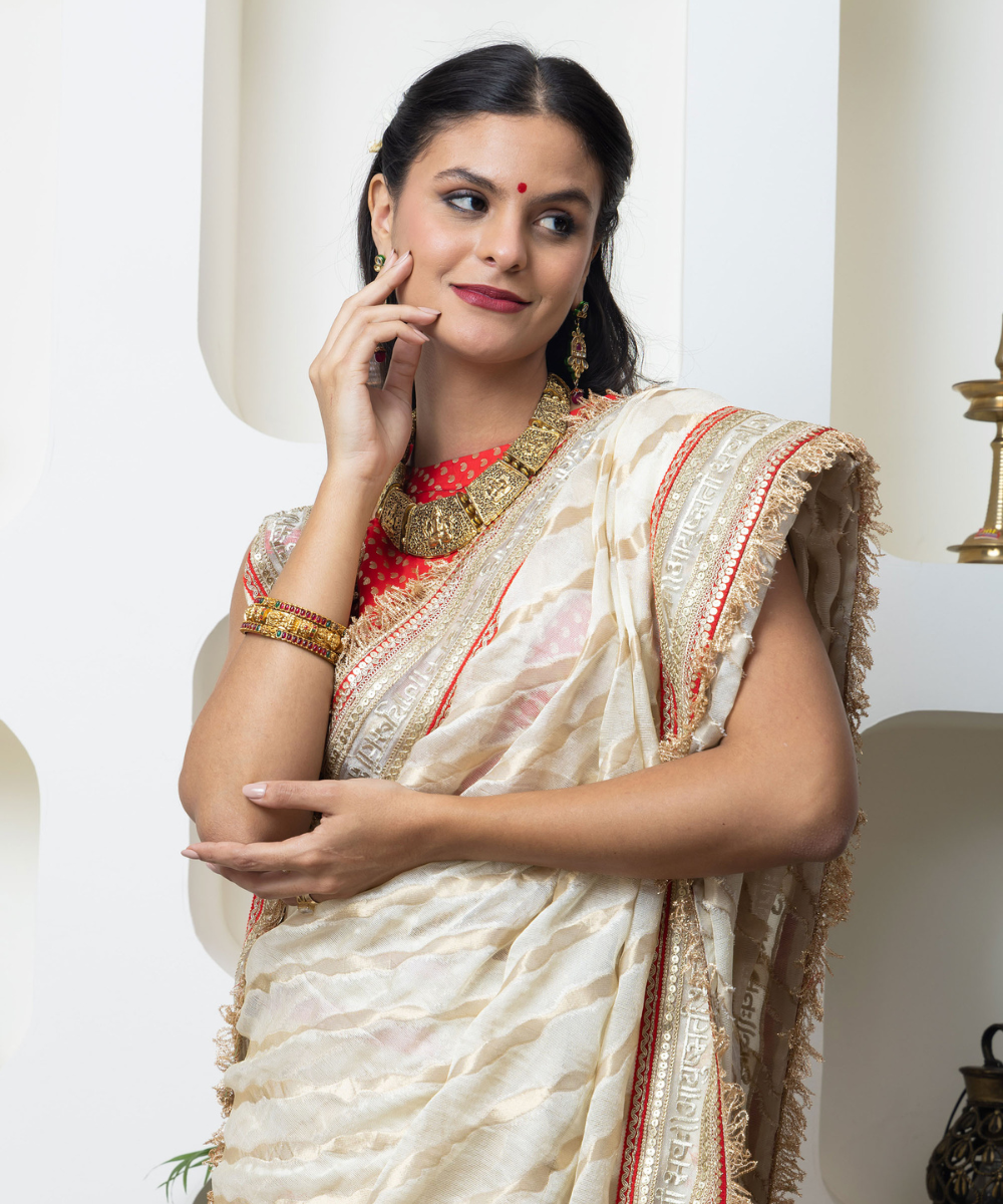 Ivory Shimmer Georgette Saree with Sanskrit Heritage Border & Red Accent Detailing - Image 5