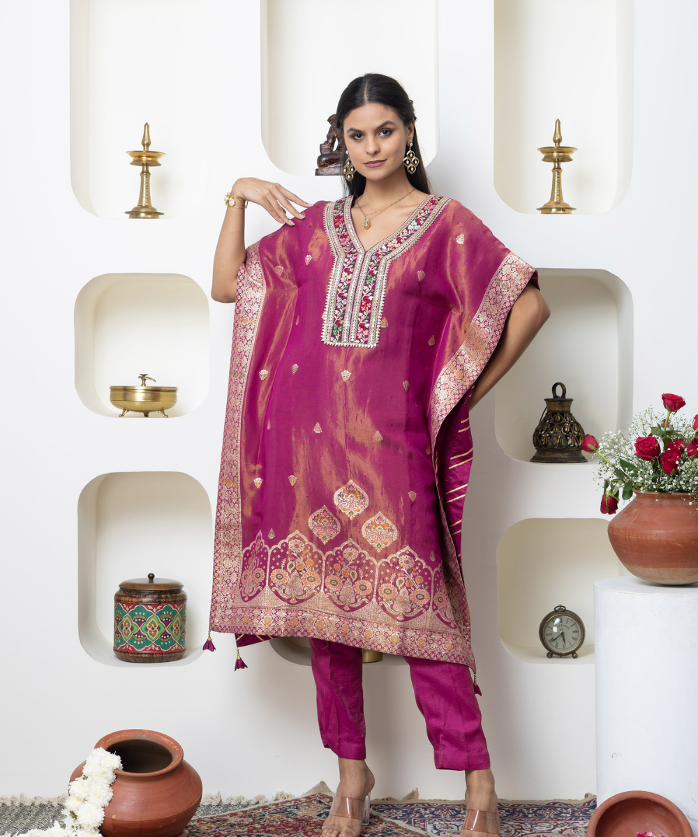 Magenta Tissue Self-Woven Indo-Western Kaftan Set with Embroidered Neckline & Gota Lace Finishing.